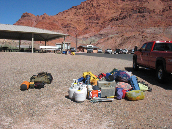 Only a tiny part of the mountains of gear we had to load on five 18-foot rafts and five wooden boats. Yes, there are 16 people on the trip. Yes, we’ll be gone for three weeks. Still, it’s a hell of a lot of gear. Inflating our five rafts. That big trailer was piled FULL when we started unloading.